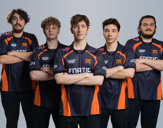 Group photo of five Fnatic players standing together