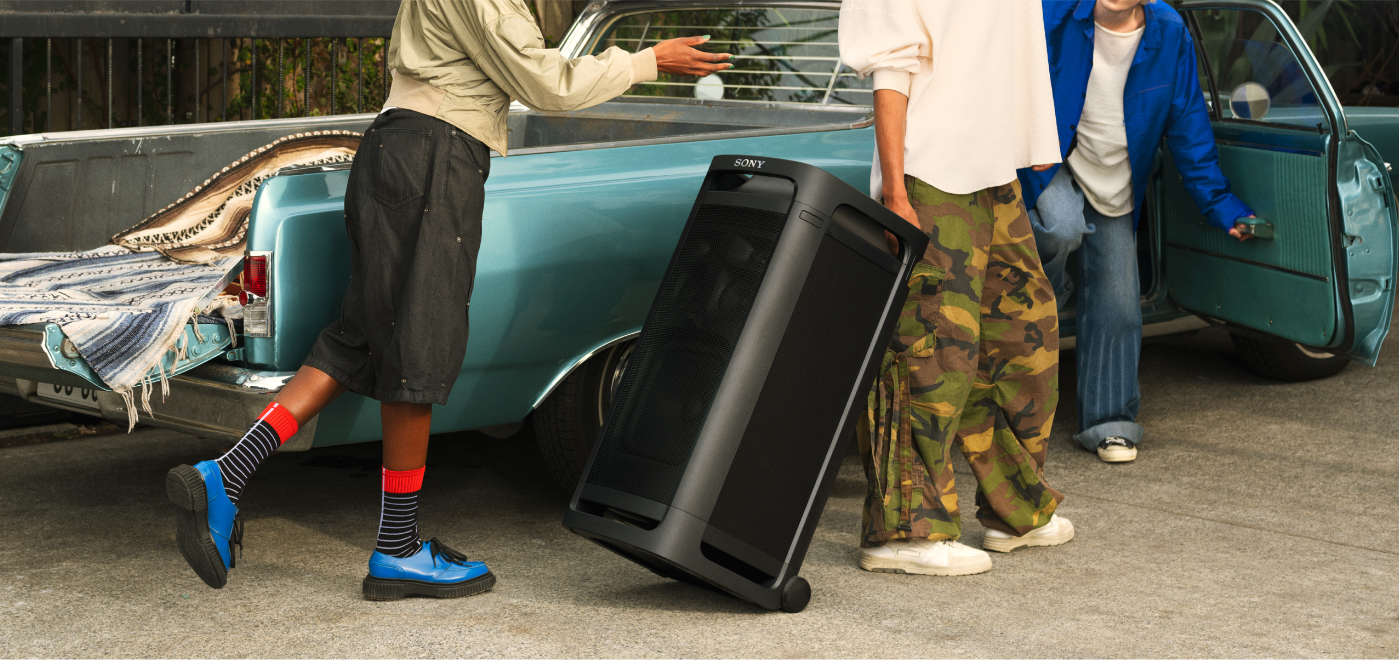 People rolling the ULT TOWER 9 on its wheels.