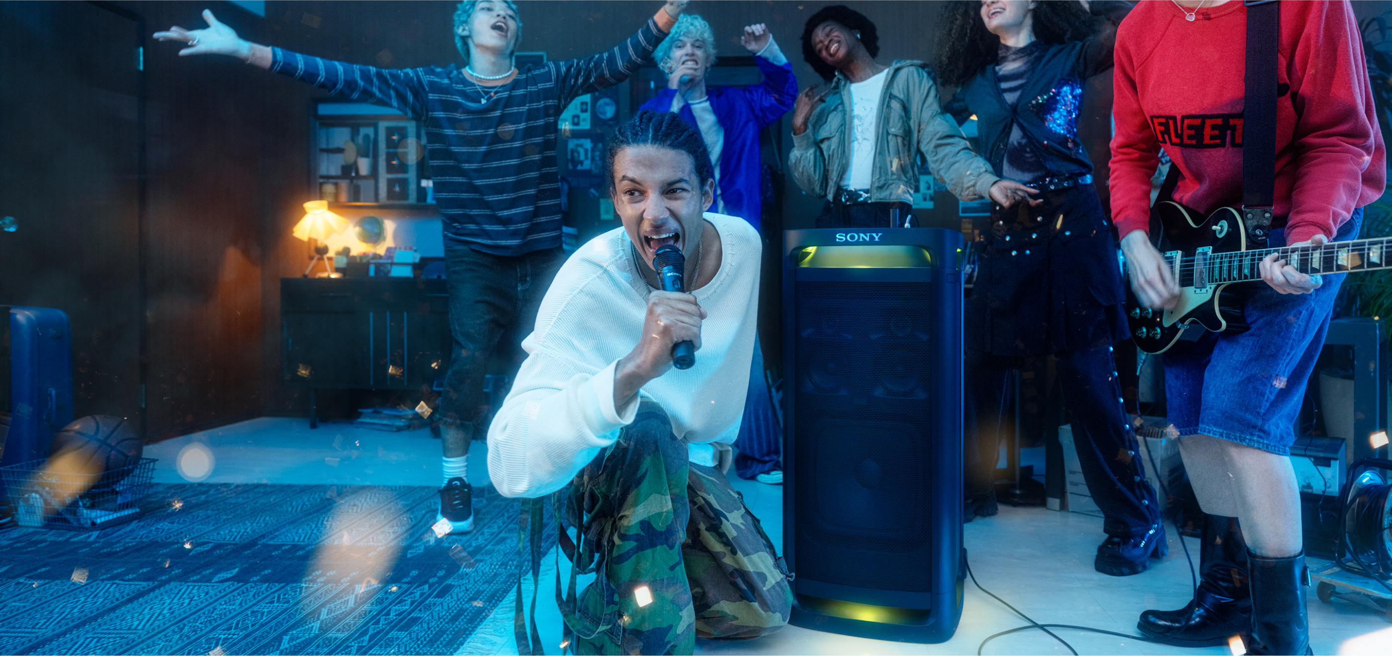 Person singing karaoke with ULT TOWER 9.