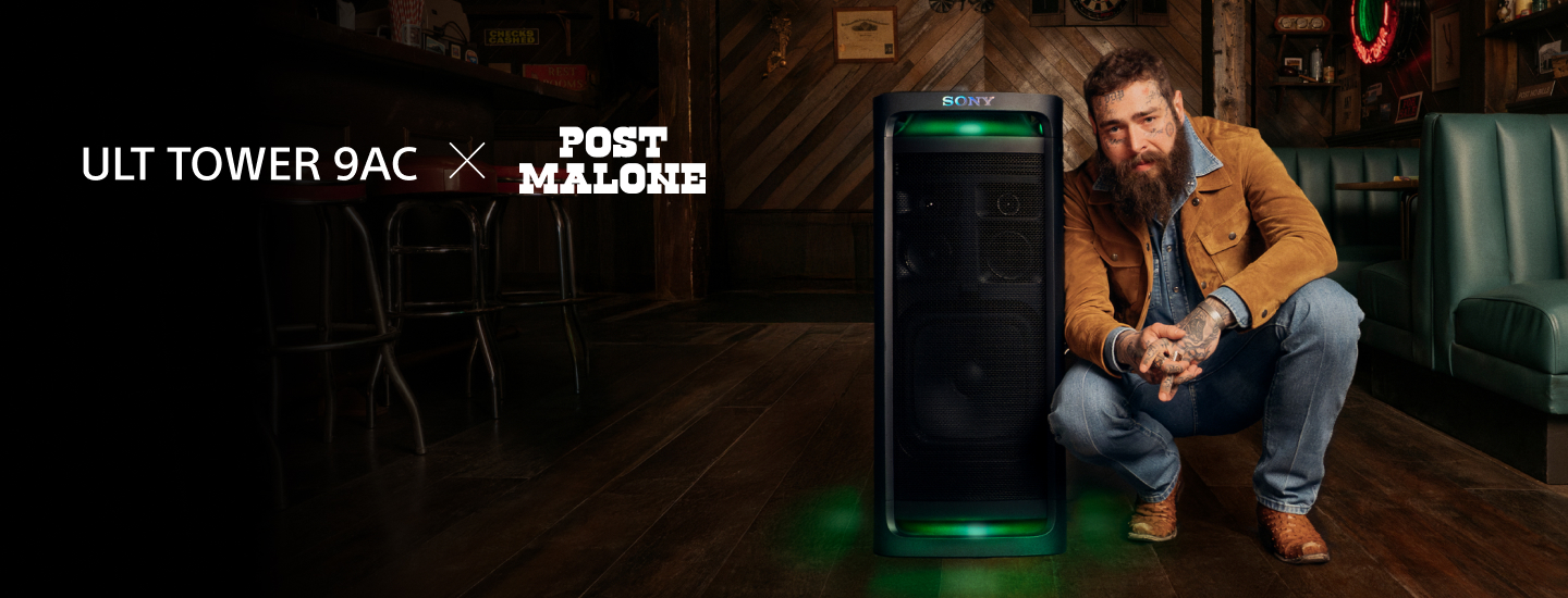 Post Malone crouches next to a large Sony ULT Tower 9AC speaker in a rustic bar setting, with "ULT Tower 9AC x Post Malone" text on the left.