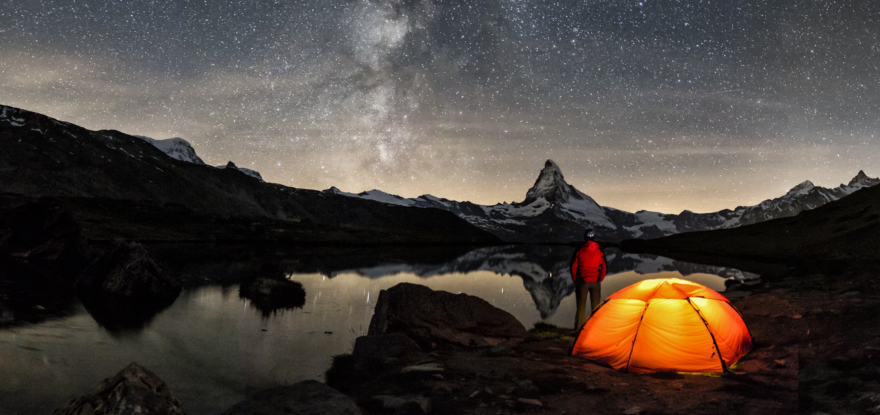 Image of camper looking at the stars.